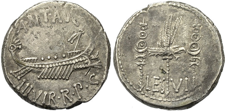 Denário de prata romano antigo que traz símbolos legionários.