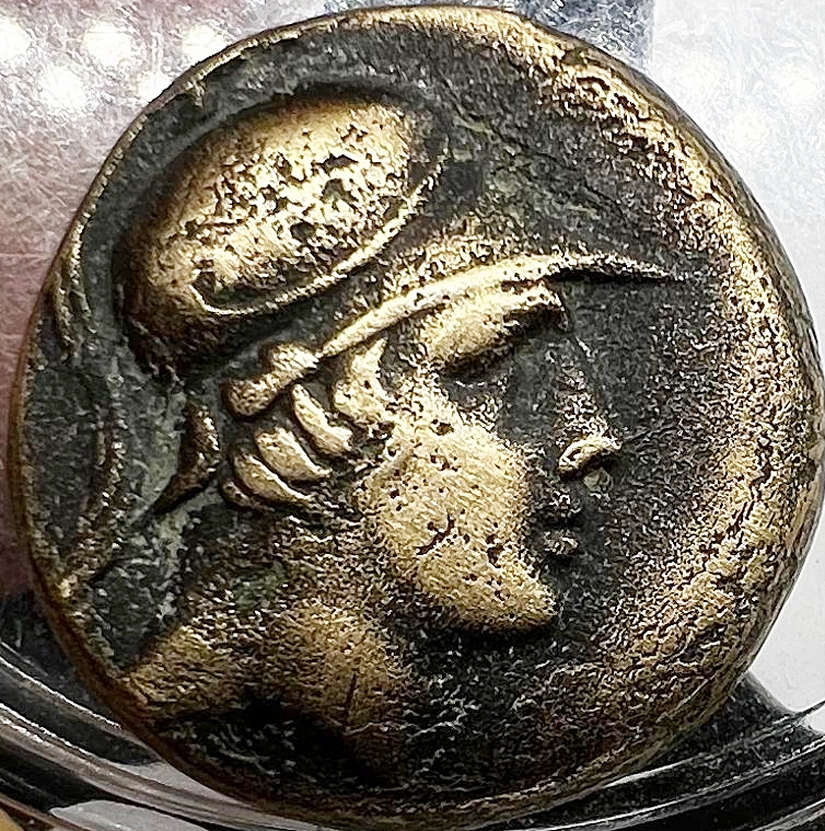 Deus Ares jovem em moeda antiga.